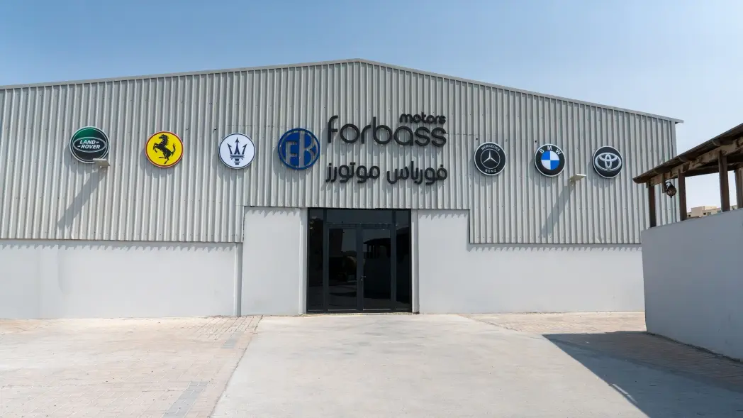 Forbass Motors garage building exterior in Doha